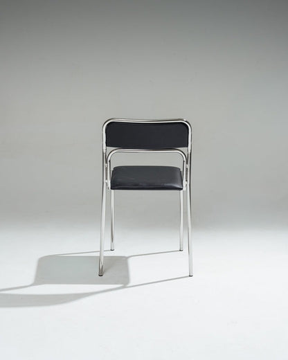 SET DE 4 CHAISES EN ACIER TUBULAIRE ET SIMILI CUIR NOIR, 1980s