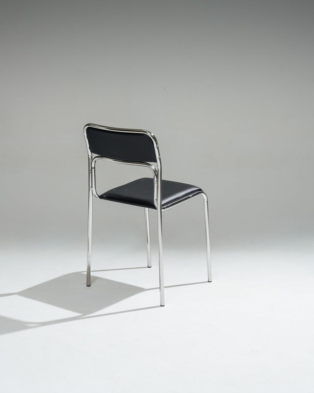 PAIRE DE CHAISES EN ACIER TUBULAIRE ET SIMILI CUIR NOIR, 1980s