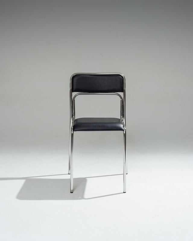 PAIRE DE CHAISES EN ACIER TUBULAIRE ET SIMILI CUIR NOIR, 1980s