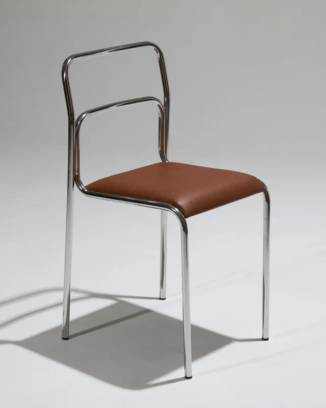 PAIR OF TUBULAR STEEL CHAIRS AND LEATHER, 1980S
