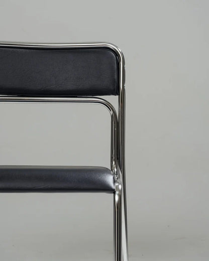 SET DE 4 CHAISES EN ACIER TUBULAIRE ET SIMILI CUIR NOIR, 1980s