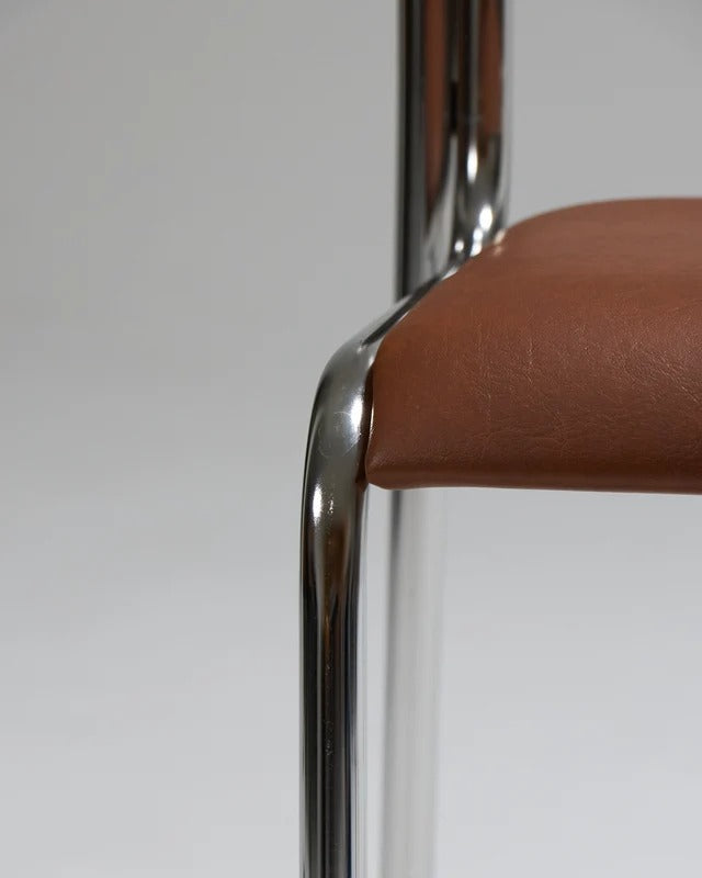 PAIR OF TUBULAR STEEL CHAIRS AND LEATHER, 1980S