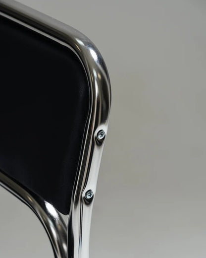 PAIRE DE CHAISES EN ACIER TUBULAIRE ET SIMILI CUIR NOIR, 1980s