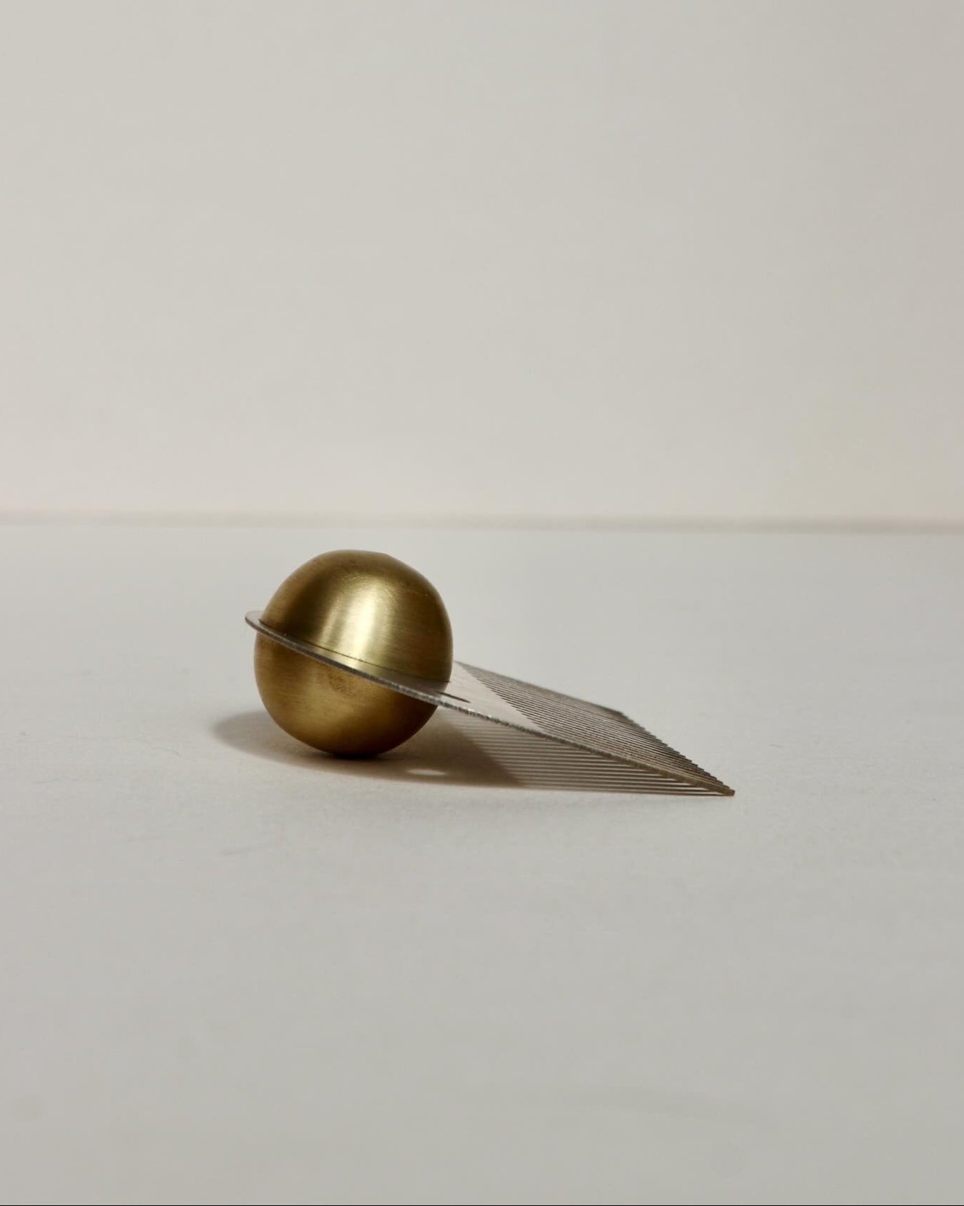 "PURE" COLLECTIBLE BRASS COMB