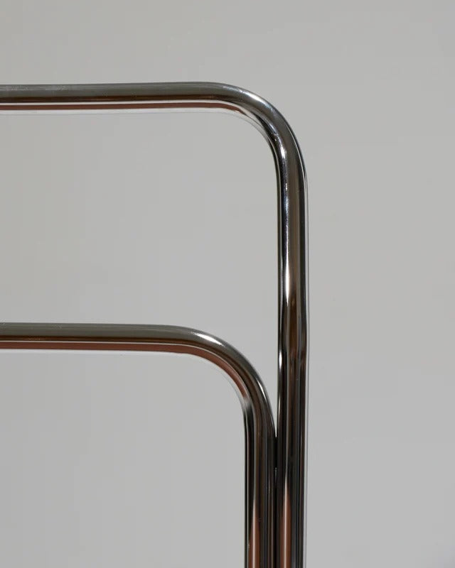 PAIR OF TUBULAR STEEL CHAIRS AND LEATHER, 1980S