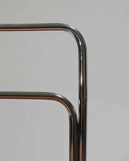 PAIR OF TUBULAR STEEL CHAIRS AND LEATHER, 1980S