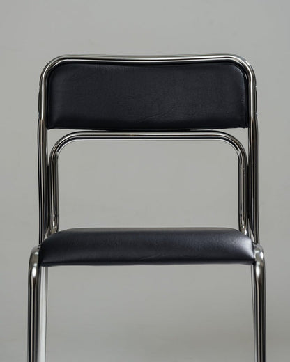 PAIRE DE CHAISES EN ACIER TUBULAIRE ET SIMILI CUIR NOIR, 1980s