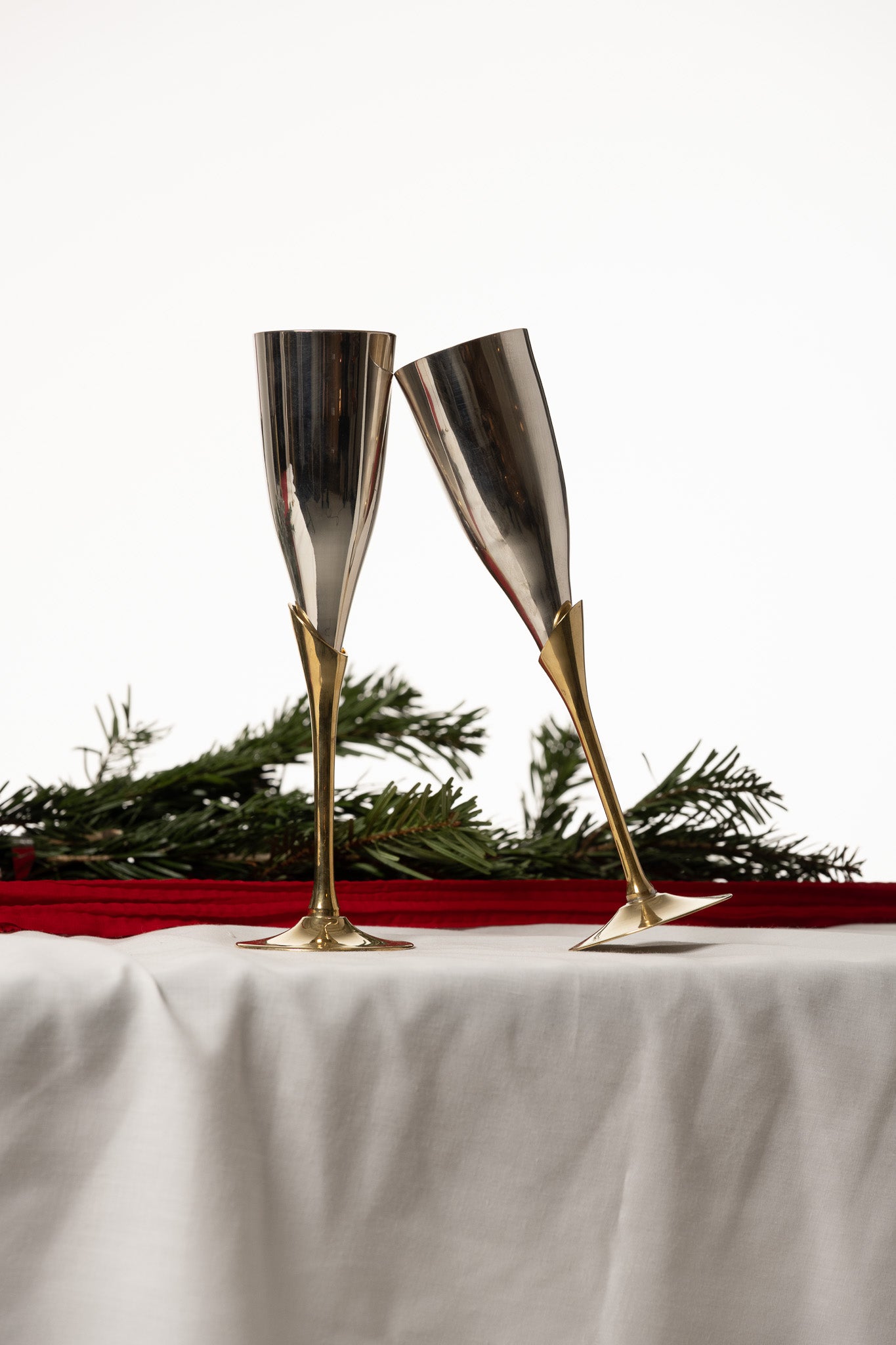 SET OF 6 METAL AND BRASS CHAMPAGNE FLUTES, 1980s