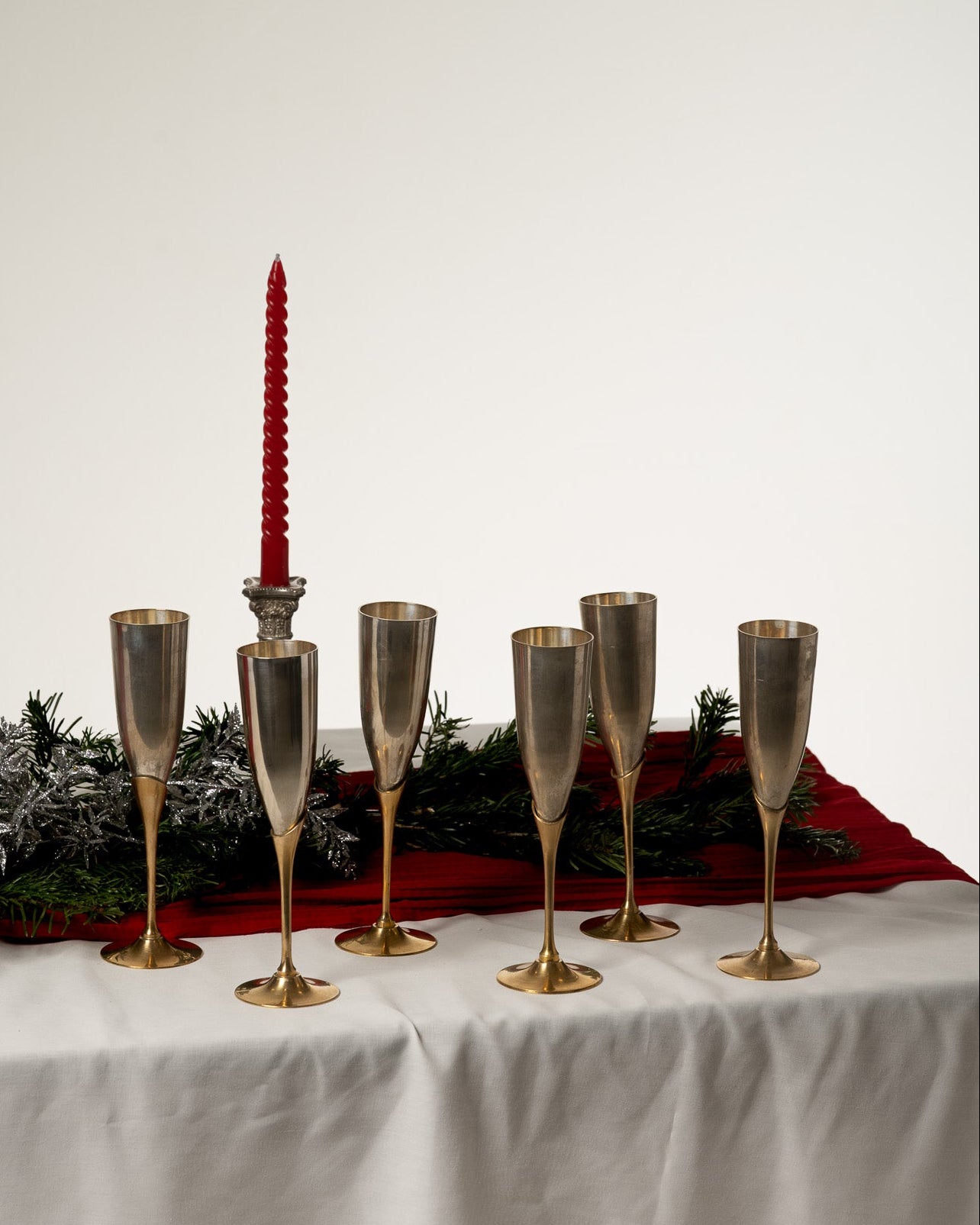 SET OF 6 METAL AND BRASS CHAMPAGNE FLUTES, 1980s