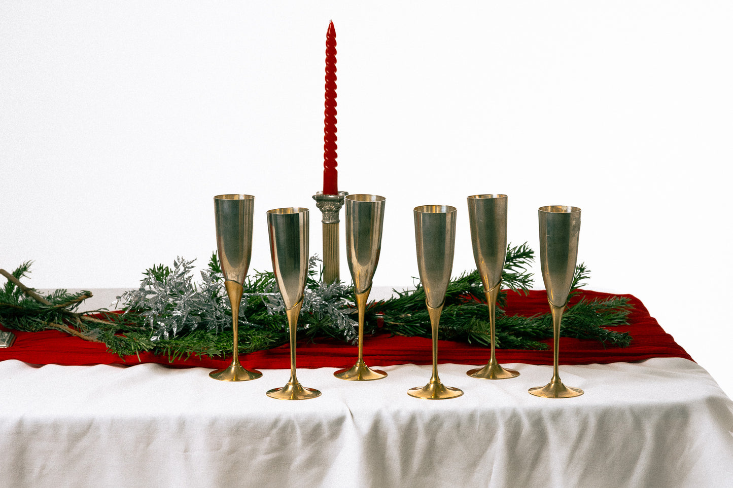 SET OF 6 METAL AND BRASS CHAMPAGNE FLUTES, 1980s