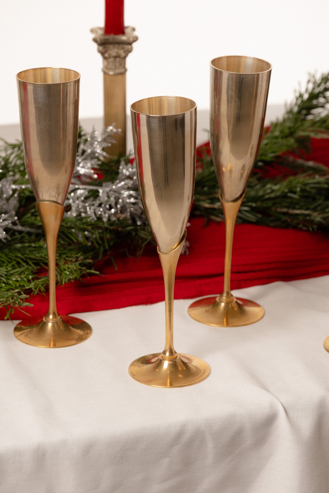 SET OF 6 METAL AND BRASS CHAMPAGNE FLUTES, 1980s